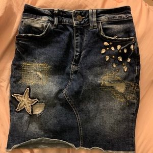 Mini denim skirt with rhinestones